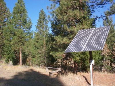 There are 12 75 watt Siemens solar panels that create a 900 watt per hour power system. This solar system provides sufficient power for our family of 2 adults and 2 children for most needs during approximately 6 months out of the year during late spring, summer and fall.